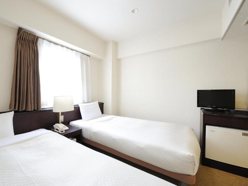 Sendai Business Hotel Ekimae Стая снимка